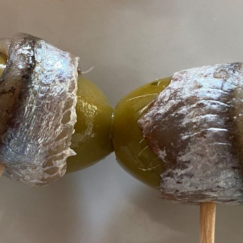 olives wrapped with anchovies ©️ Nel Brouwer-van den Bergh